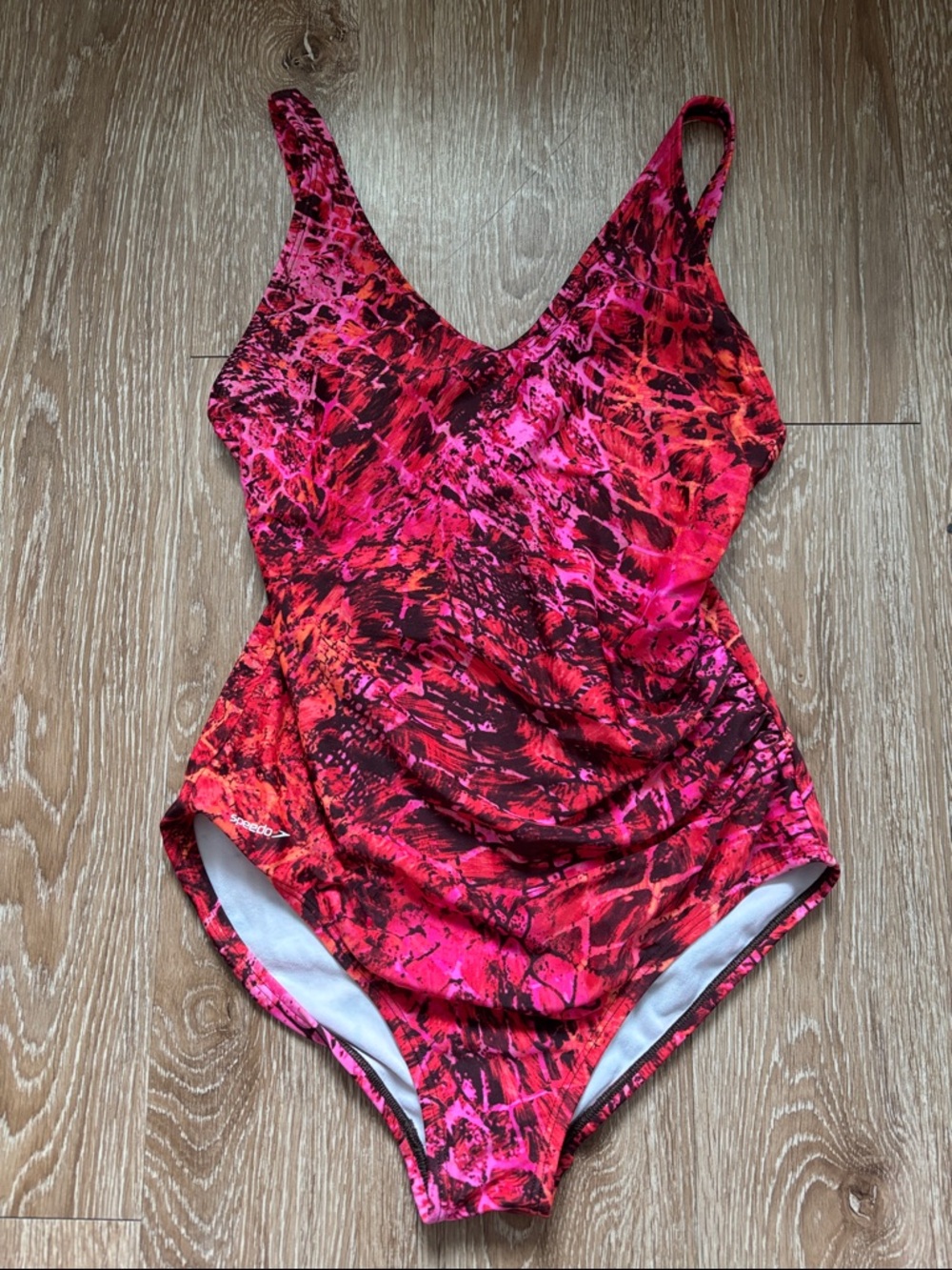 Speedo pink/orange snakeskin print one piece bathing suit, size 10